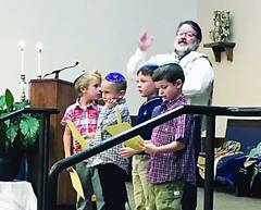 		                                		                                <span class="slider_title">
		                                    Rabbi Jay with the Kids		                                </span>
		                                		                                
		                                		                            	                            	
		                            <span class="slider_description">Rabbi Jay is active with our religious school and you will often find him in the classrooms or participating in T'filiah (prayer) with the children.</span>
		                            		                            		                            